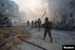 Tentara Israel beroperasi di Jalur Gaza di tengah konflik yang sedang berlangsung antara Israel dan kelompok Islam Palestina Hamas, dalam gambar selebaran yang dirilis pada 21 Januari 2024. (Foto: via Reuters)